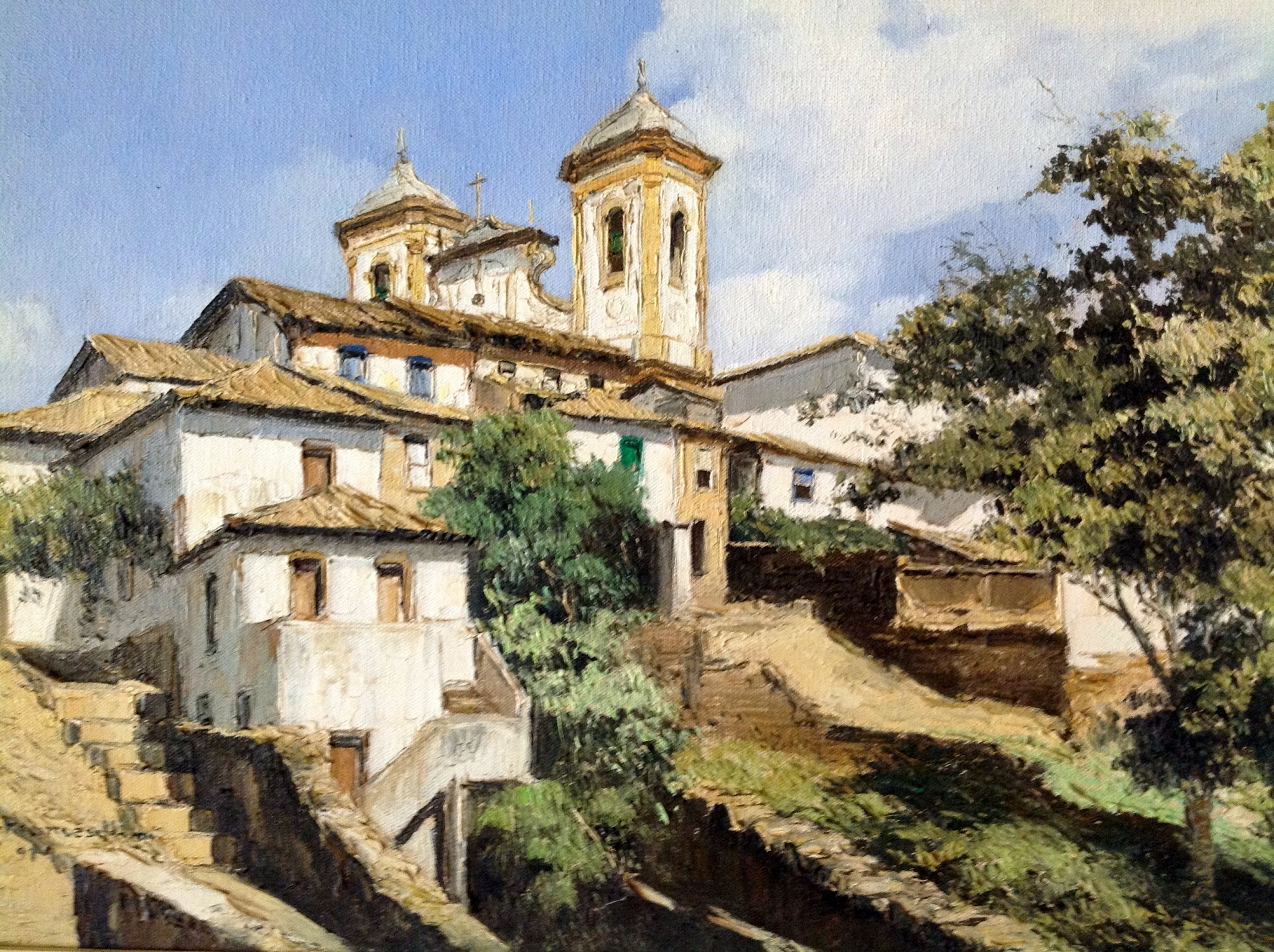 Ouro Preto III — Igreja e casario distribuídos em diferentes níveis de uma encosta.