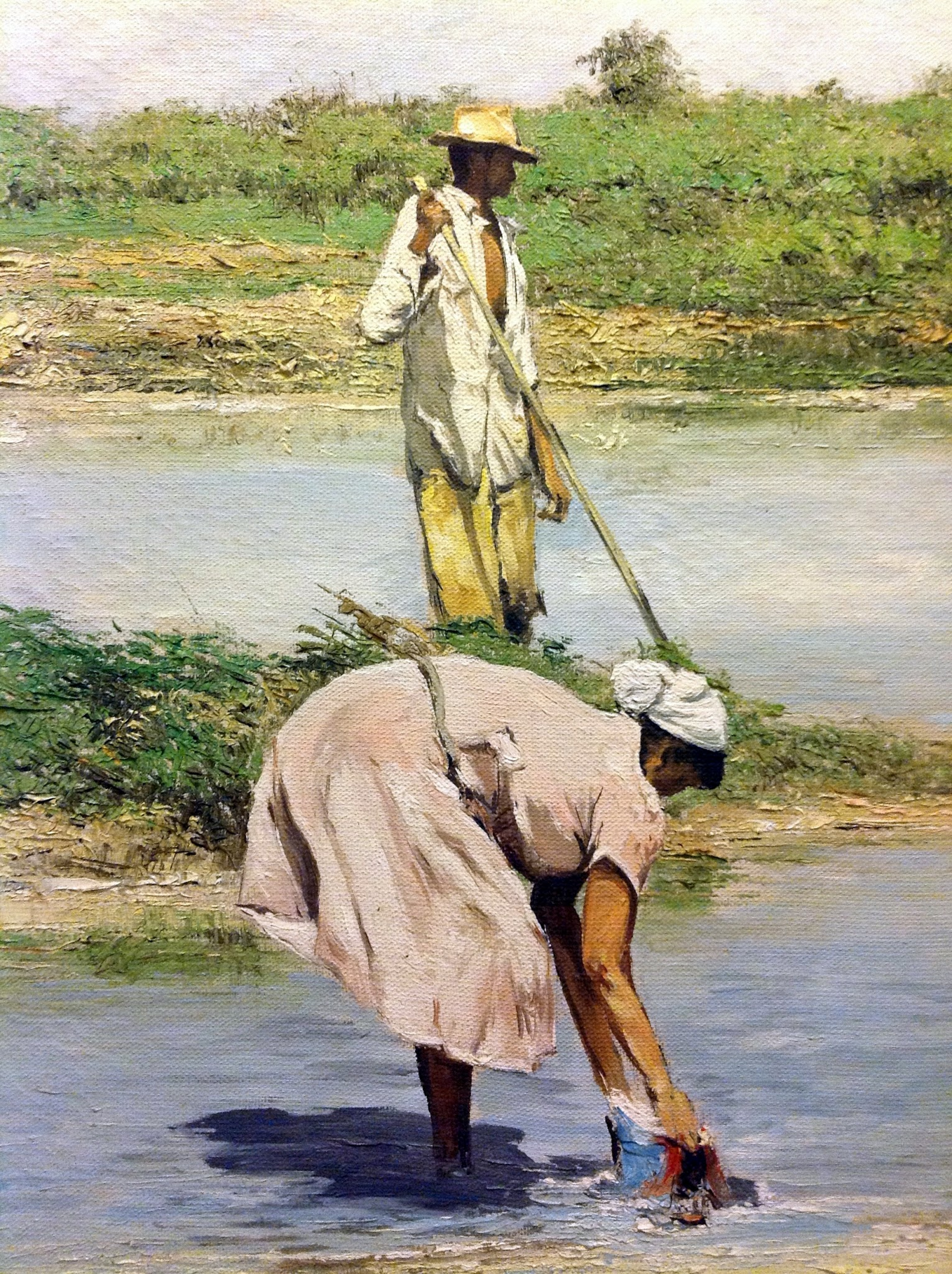 Lavando Homem e mulher — Homem e mulher trabalham à beira d’água em uma cena de lavagem de roupas.